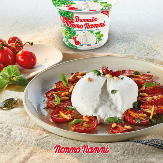 Seared tomatoes, pine nuts, vinaigrette and basil with Nonno Nanni Burrata